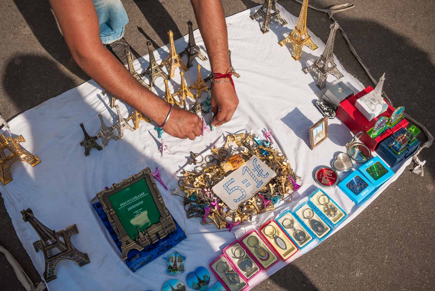 African immigrants display their assorted crap to passers by.