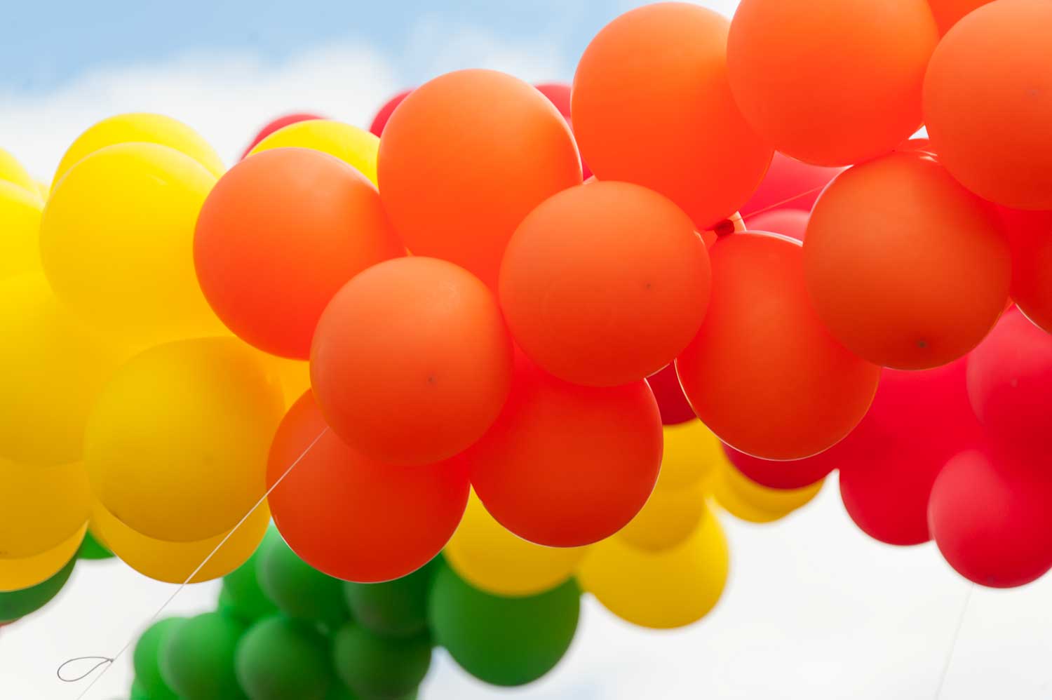 Balloons fly in the wake of the queen.