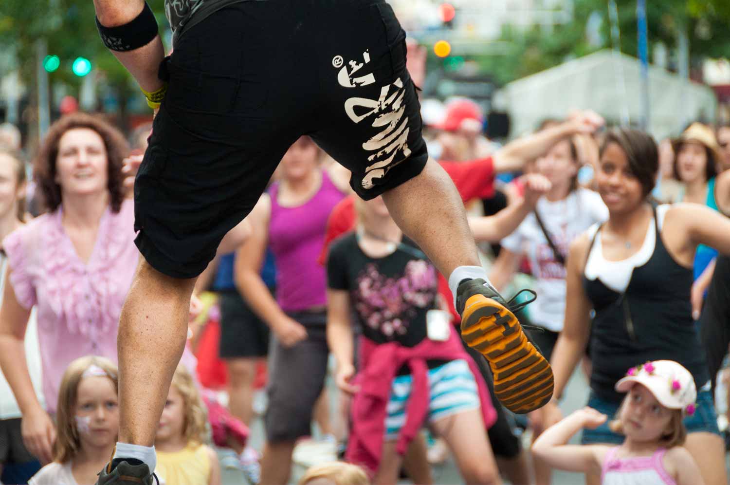 An open Zumba session takes place at the base of Queen St.